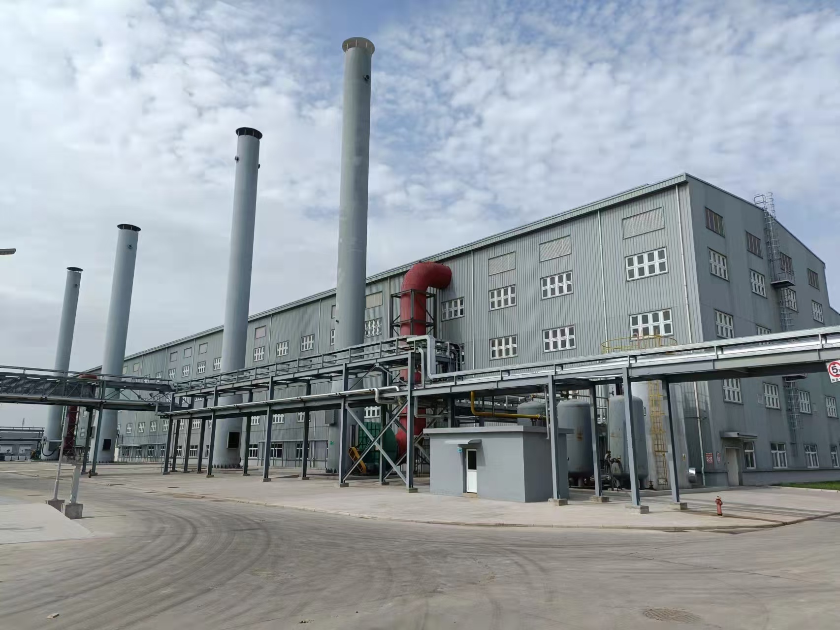 Polymer production building and process stacks